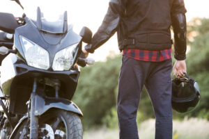 Man Looking to find motorcycle parking.